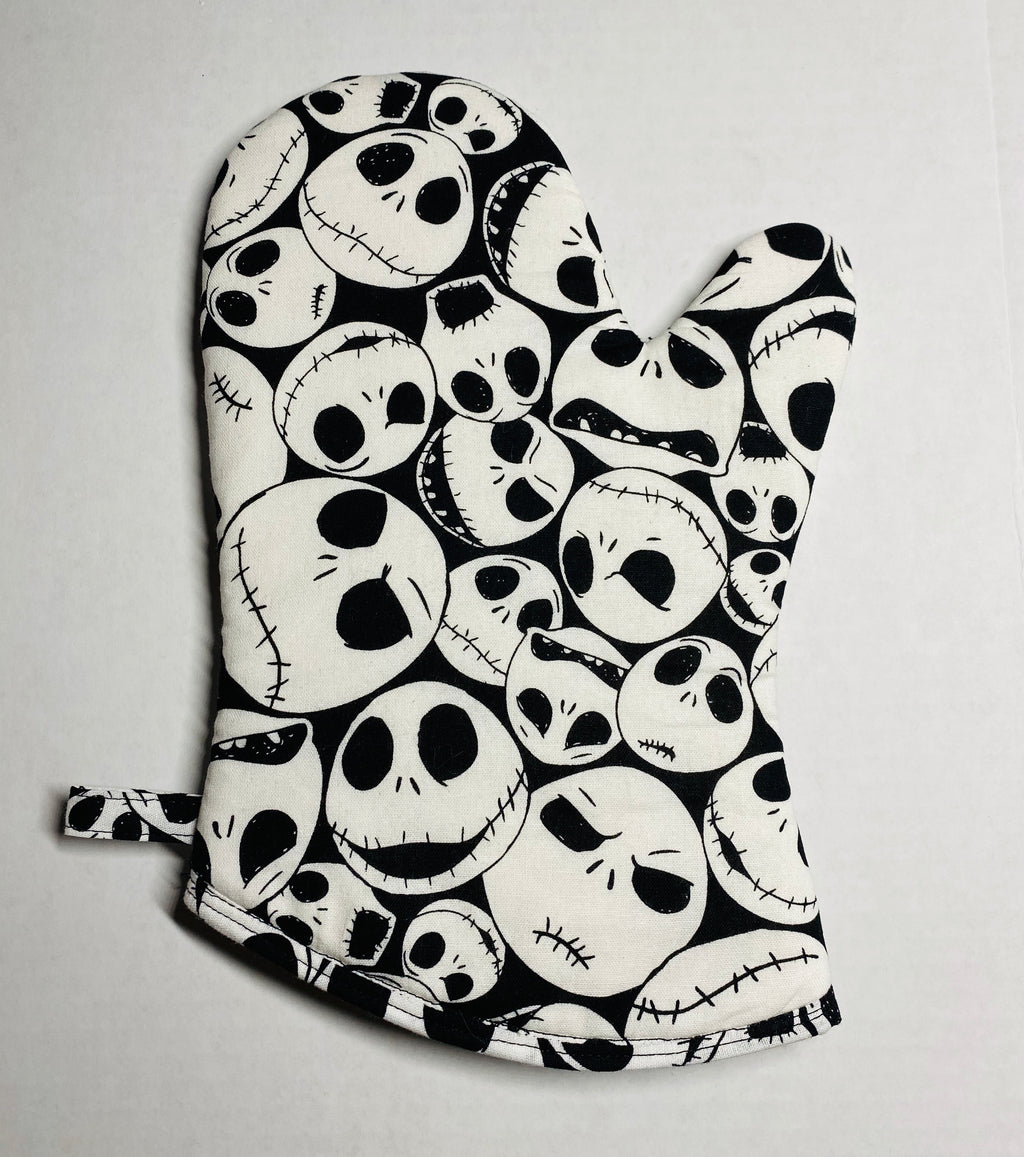 Beetlejuice or Nightmare Before Christmas potholders/oven mitts