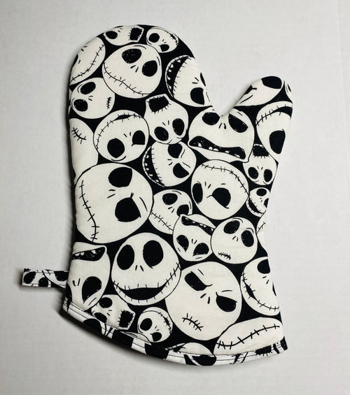 Beetlejuice or Nightmare Before Christmas potholders/oven mitts
