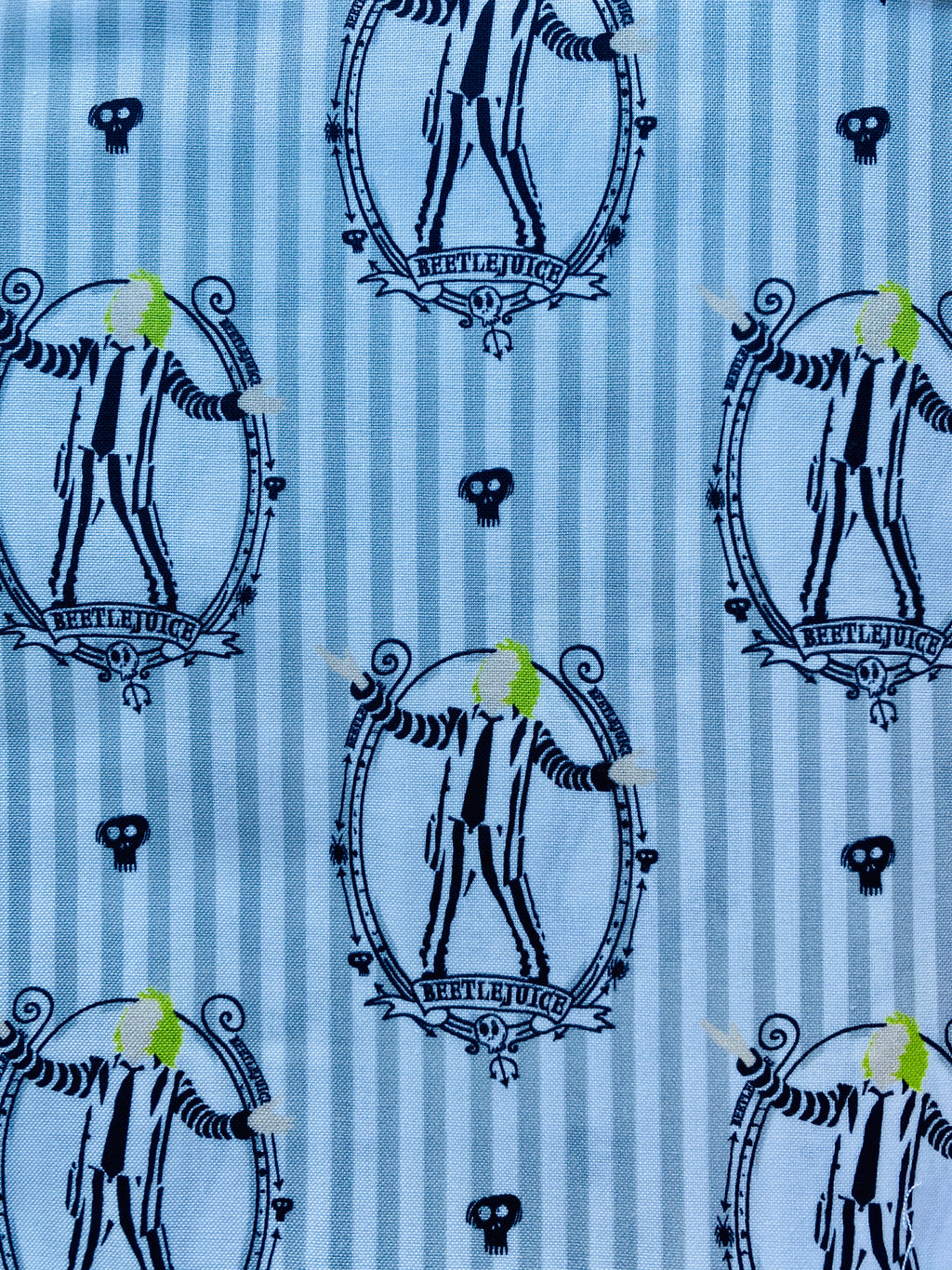 Beetlejuice or Nightmare Before Christmas potholders/oven mitts